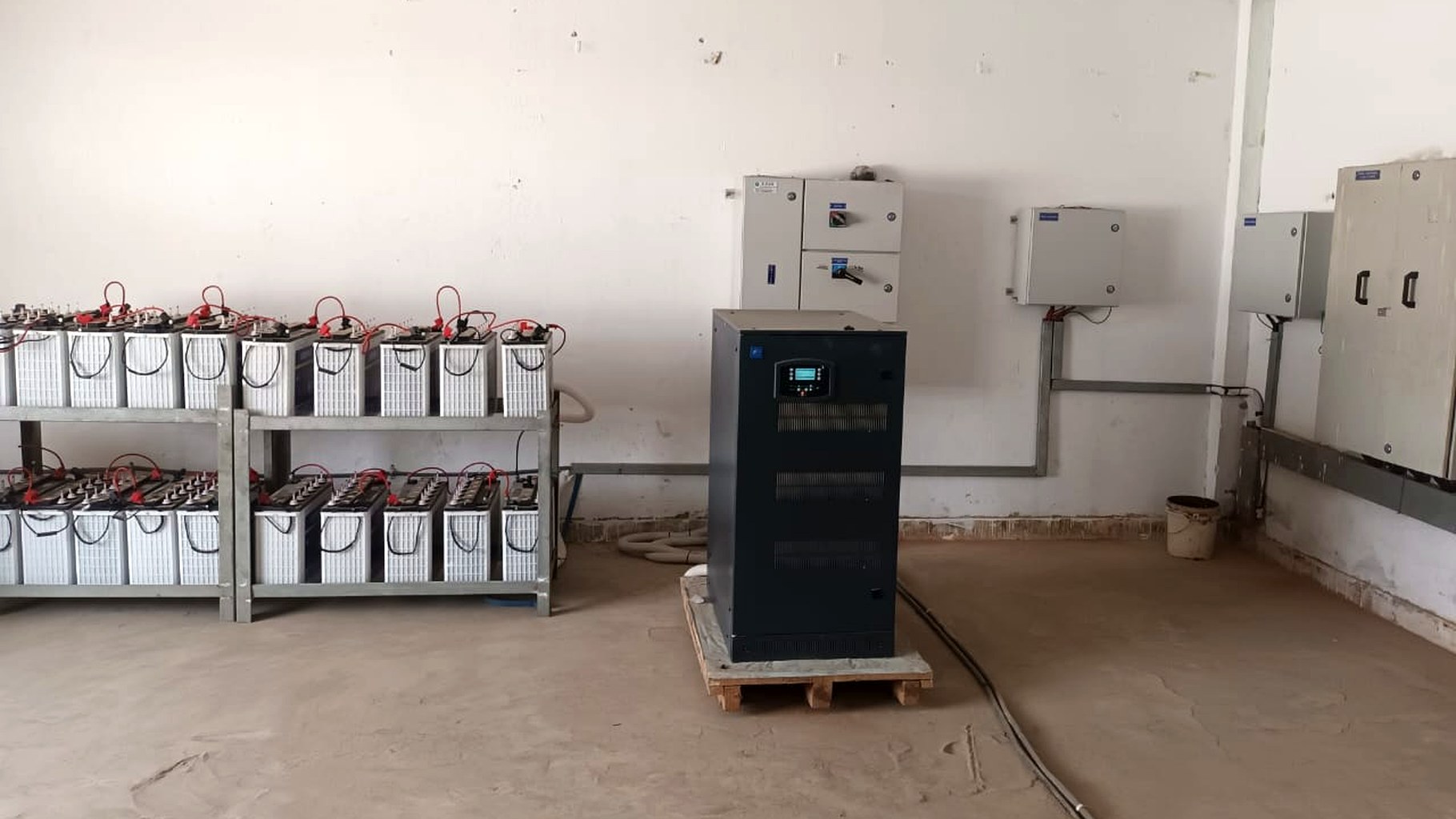 Industrial hybrid solar inverter and battery bank installation by MGetEnergy — example of the C&I architecture used in hybrid systems with battery storage