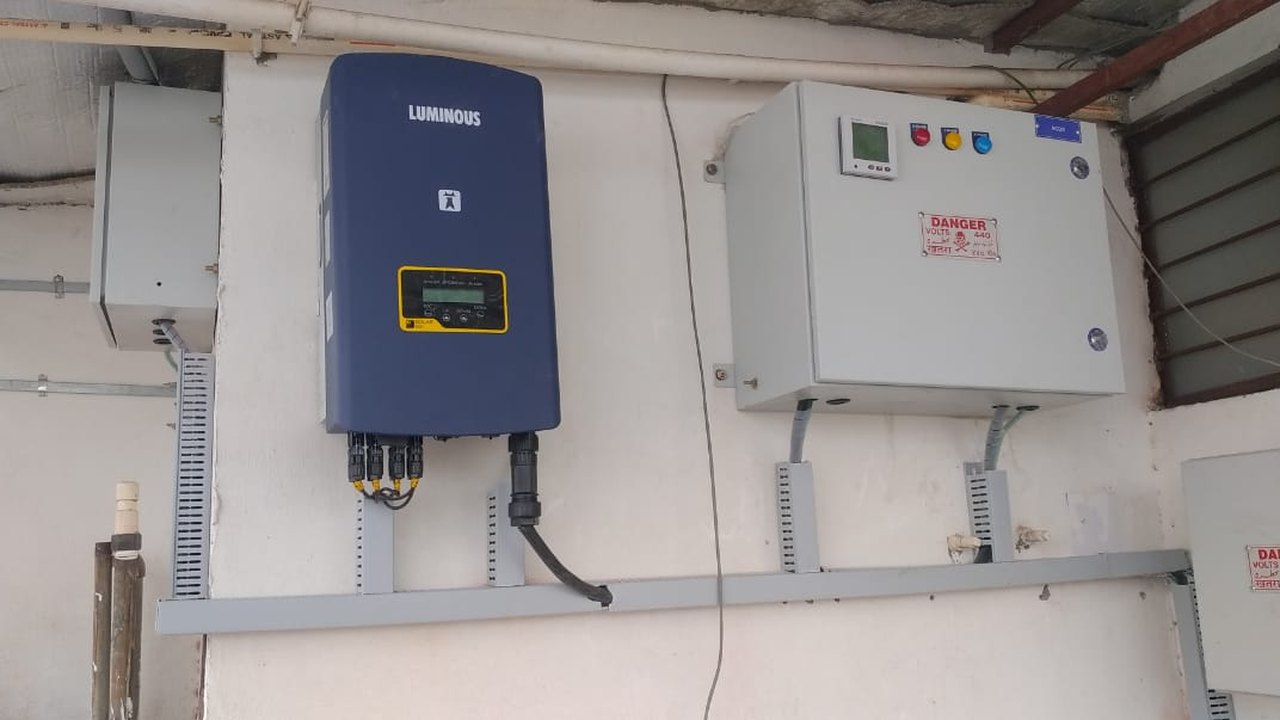 Luminous 20 kW grid tie inverter with the AC distribution box and cable tray at the Lajpat Nagar hotel, New Delhi