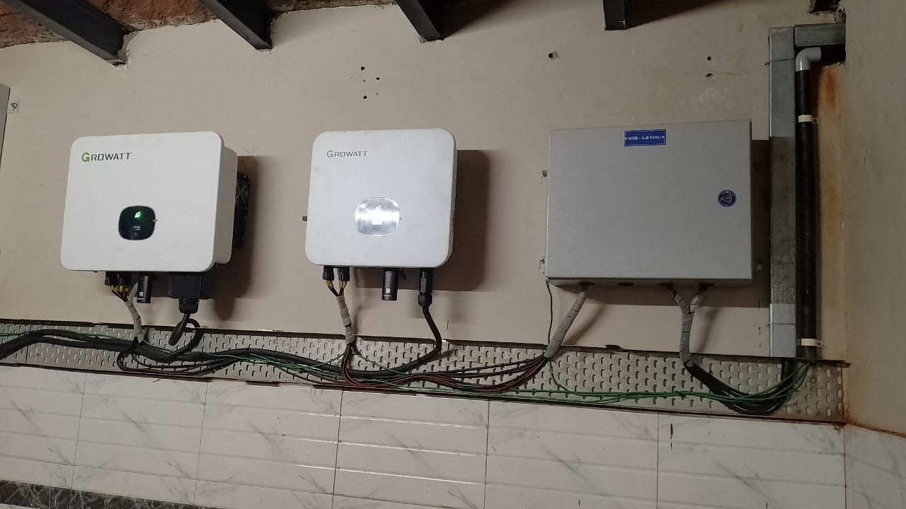 Growatt 25 kW and 15 kW grid tie inverters beside the DC distribution and array junction box panel at Prabhat Namkeen, Greater Noida